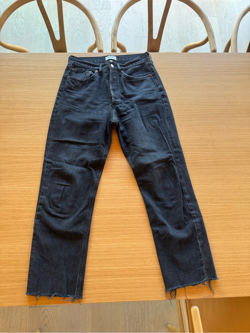 Agolde Black Straight-Leg Jeans with Raw Hem Detail